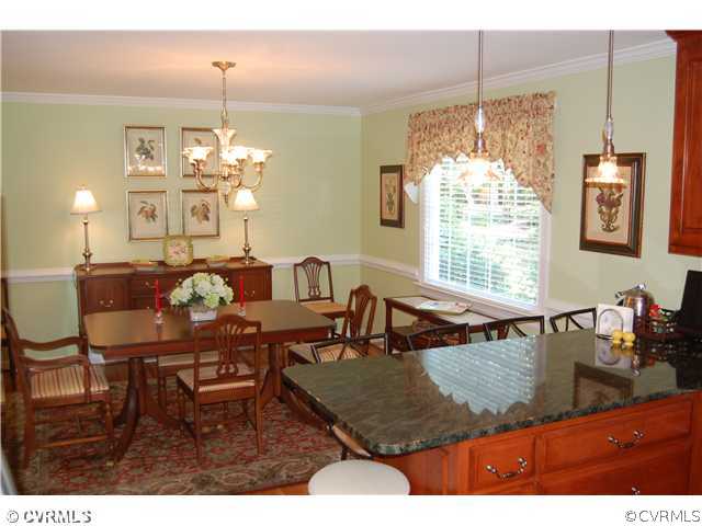 13620 Thorngate Road Midlothian, VA 23113 - Photo 5 of 12 a dining room view with furniture and chandelier
