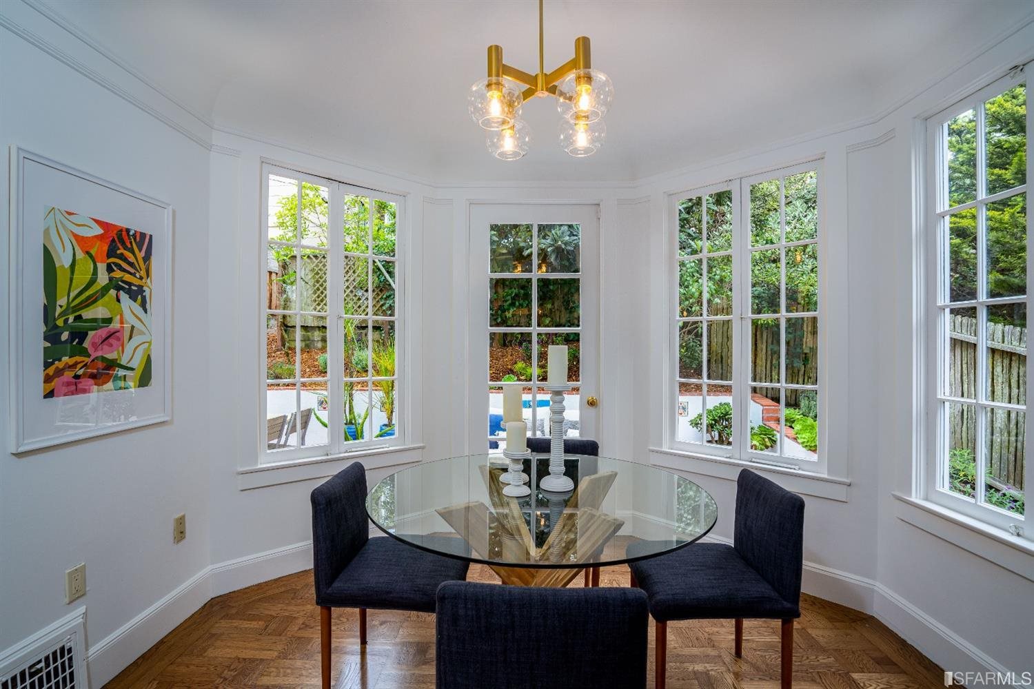 369 Pacheco Street San Francisco, CA 94116 - Photo 14 of 49 a view of a dining room with furniture a couch and a potted plant