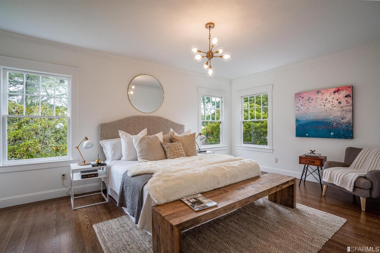 369 Pacheco Street San Francisco, CA 94116 - Photo 18 of 49 a bedroom with a bed and window