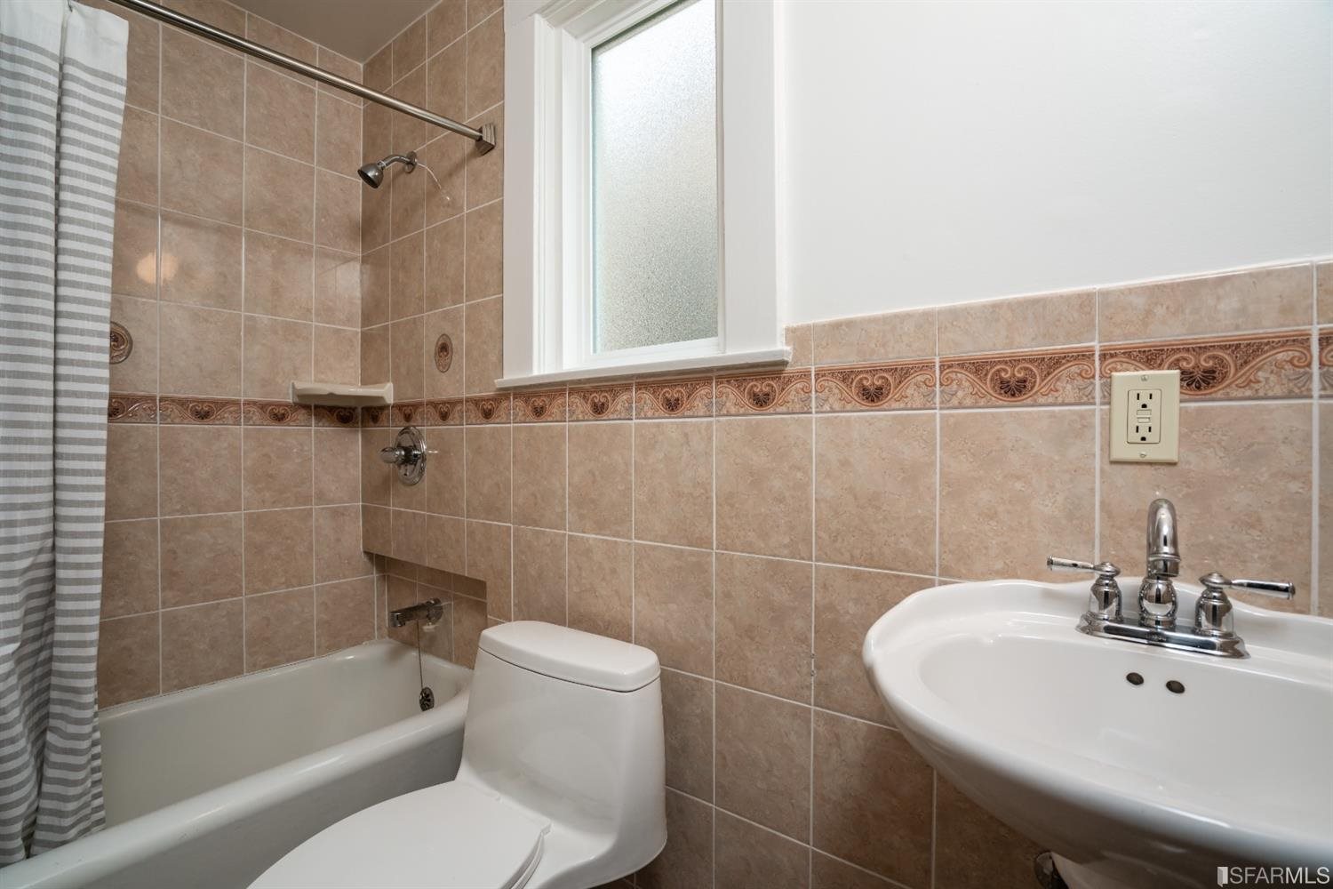 369 Pacheco Street San Francisco, CA 94116 - Photo 26 of 49 a bathroom with a sink mirror toilet and bathtub