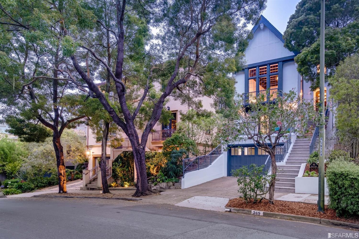 369 Pacheco Street San Francisco, CA 94116 - Photo 3 of 49 front view of a house with a tree