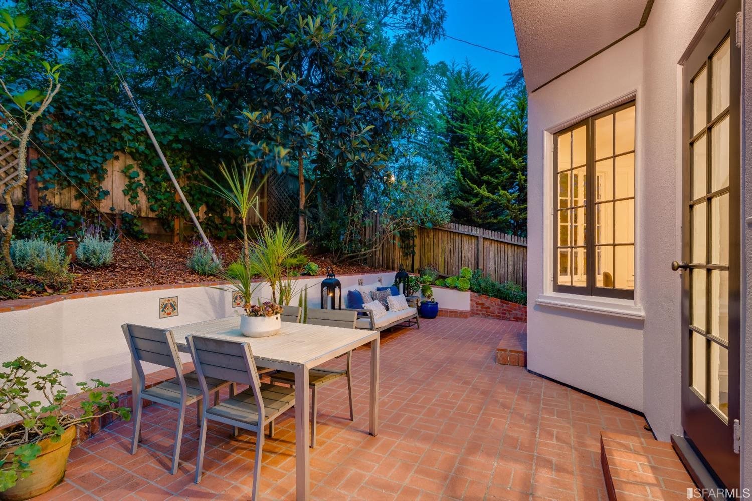 369 Pacheco Street San Francisco, CA 94116 - Photo 32 of 49 a view of a backyard with a patio and outdoor seating