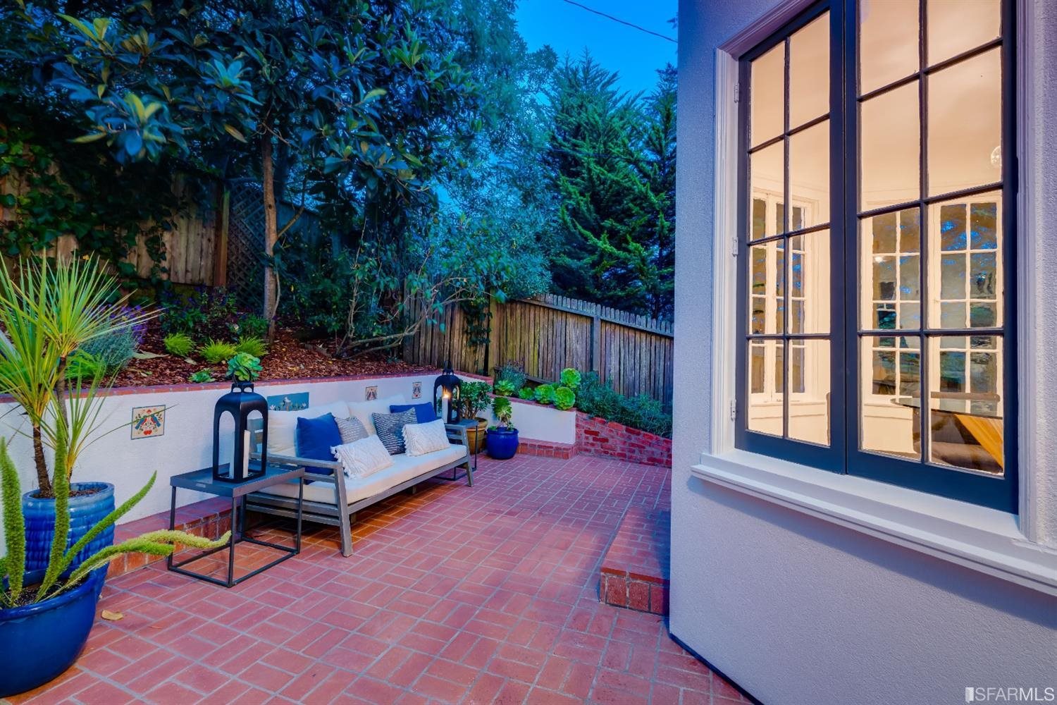 369 Pacheco Street San Francisco, CA 94116 - Photo 33 of 49 a view of an outdoor sitting area with a house