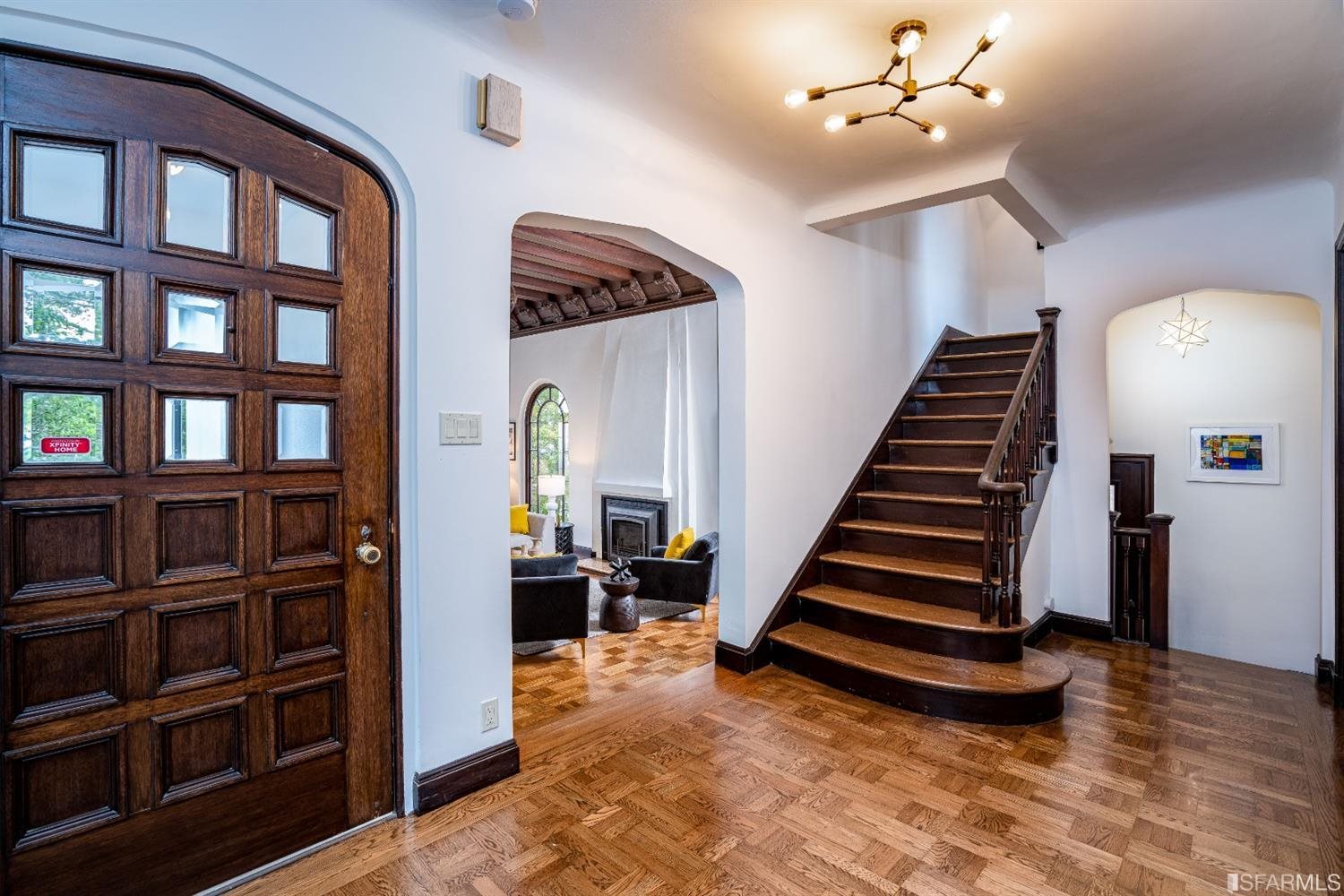 369 Pacheco Street San Francisco, CA 94116 - Photo 4 of 49 a view of a livingroom with furniture and staircase