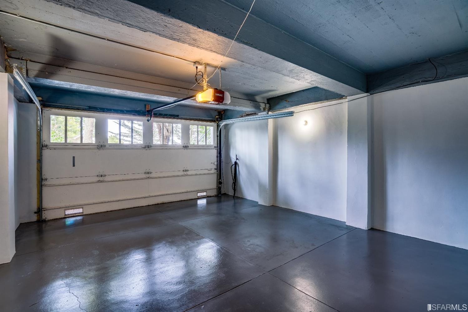 369 Pacheco Street San Francisco, CA 94116 - Photo 42 of 49 an empty room with wooden floor and windows