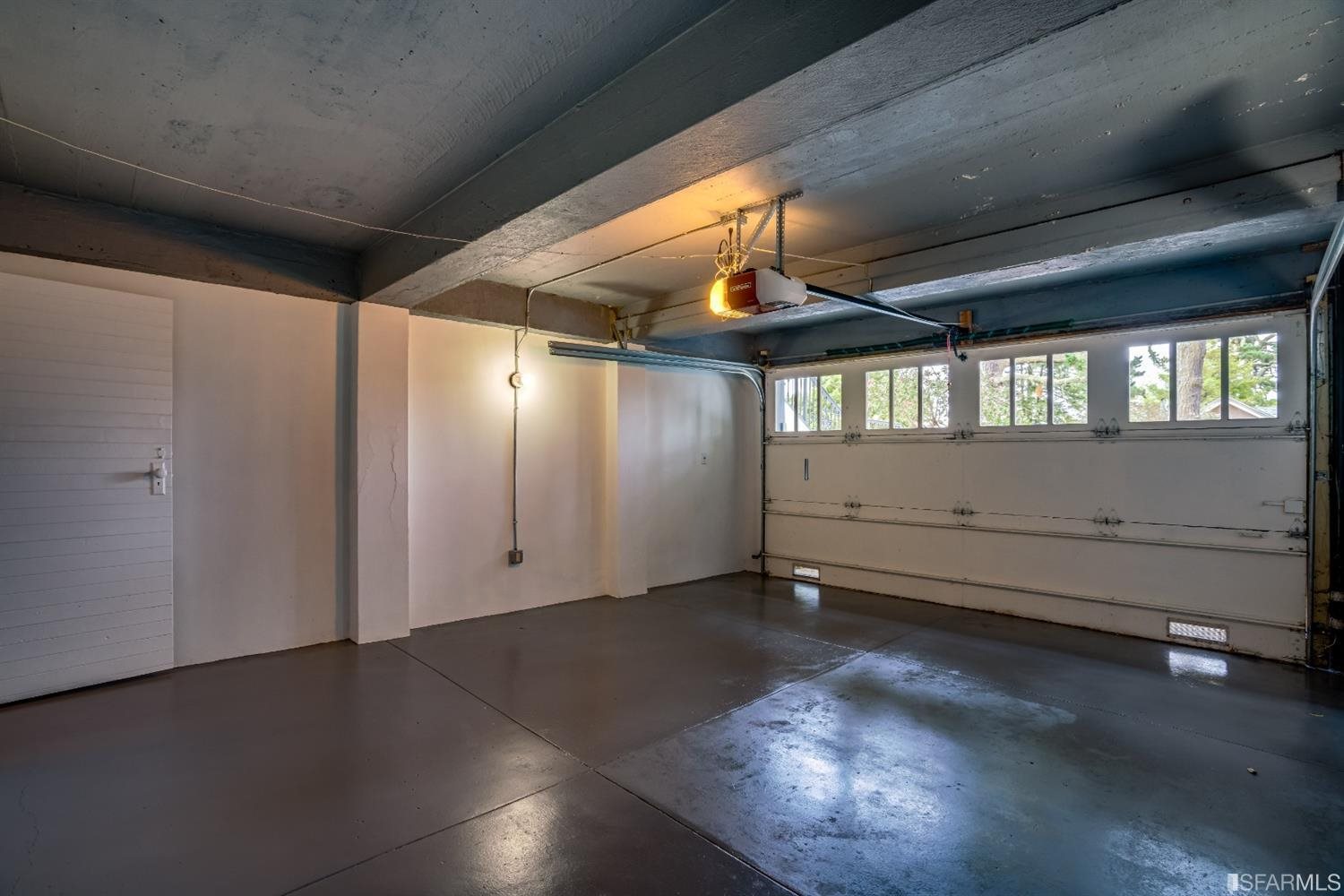 369 Pacheco Street San Francisco, CA 94116 - Photo 43 of 49 an empty room with wooden floor and windows