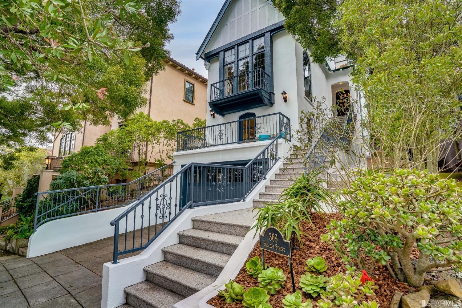 369 Pacheco Street San Francisco, CA 94116 - Photo 46 of 49 a view of a house with a yard