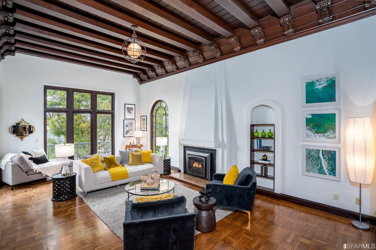 369 Pacheco Street San Francisco, CA 94116 - Photo 5 of 49 a living room with furniture and a fireplace