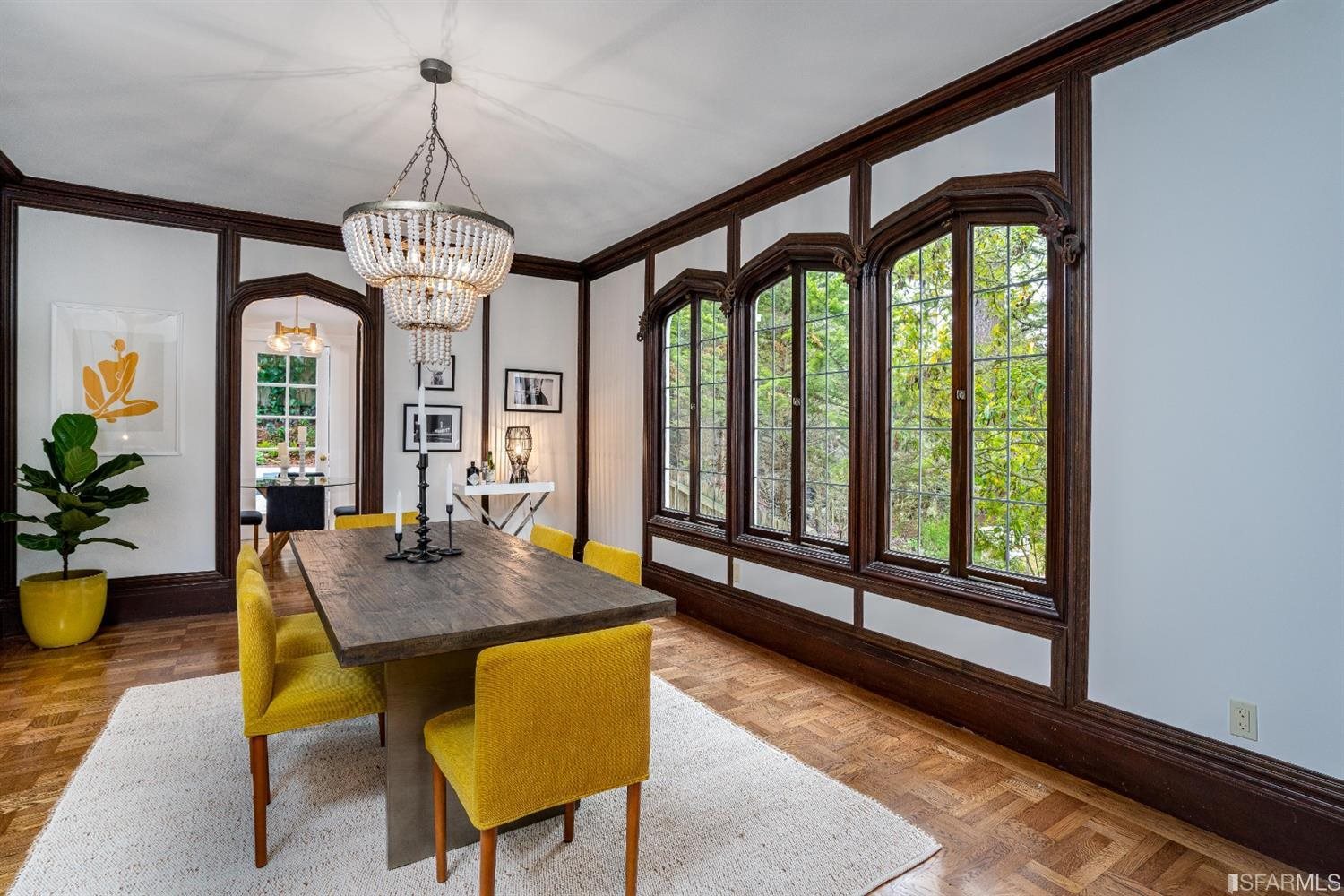 369 Pacheco Street San Francisco, CA 94116 - Photo 8 of 49 a view of a dining room with furniture window and wooden floor