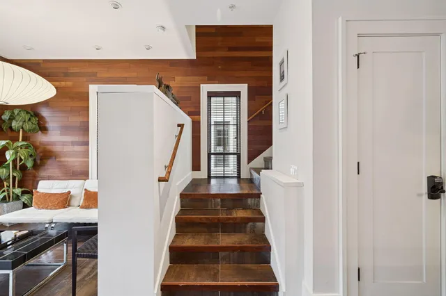 a bathroom with a granite countertop sink mirror and double