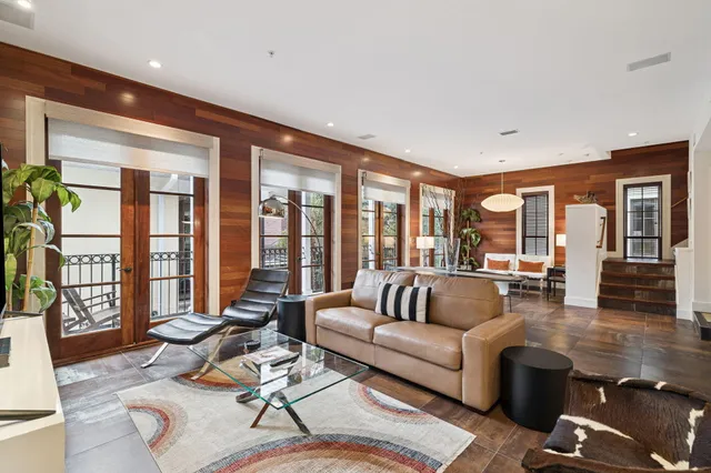 a kitchen with stainless steel appliances a sink stove and cabinets