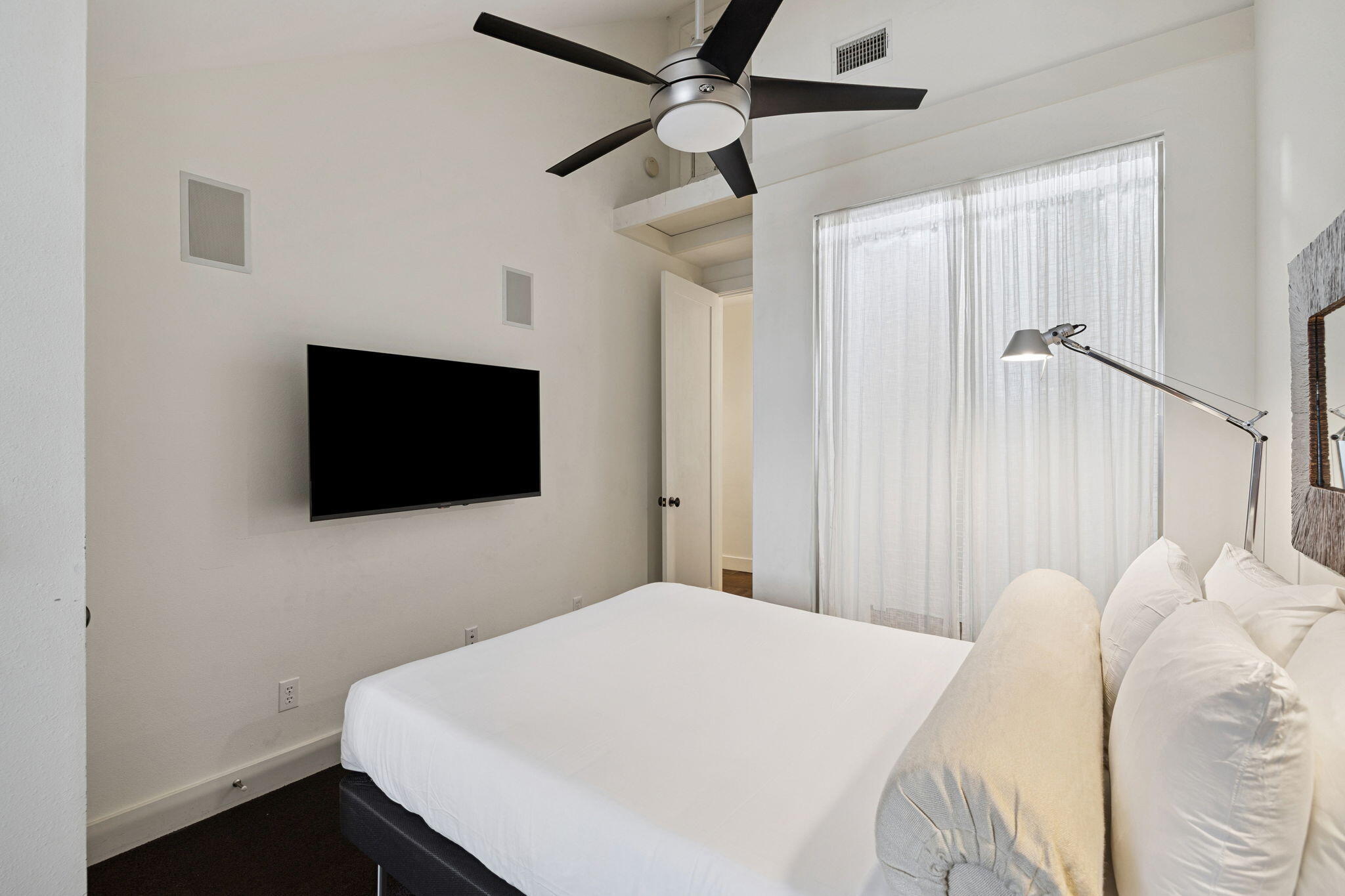 246 Fisherman's Cove, Unit 246 Miramar Beach, FL 32550 - Photo 25 of 72 a bedroom with a bed and a flat screen tv