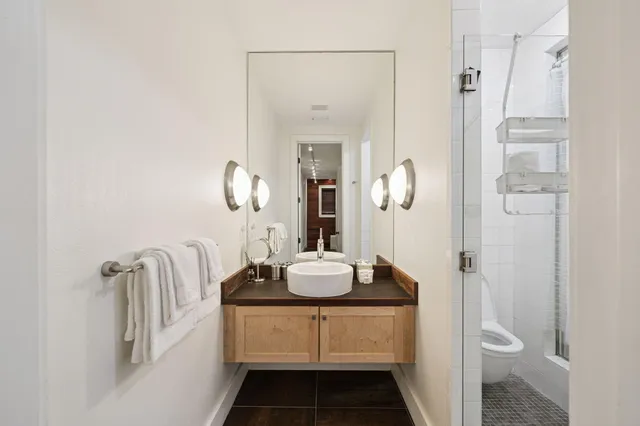 a view of a pathway with a house in the background