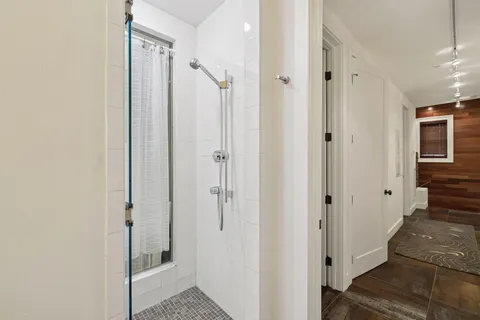 a view of path along with retail shop and buildings