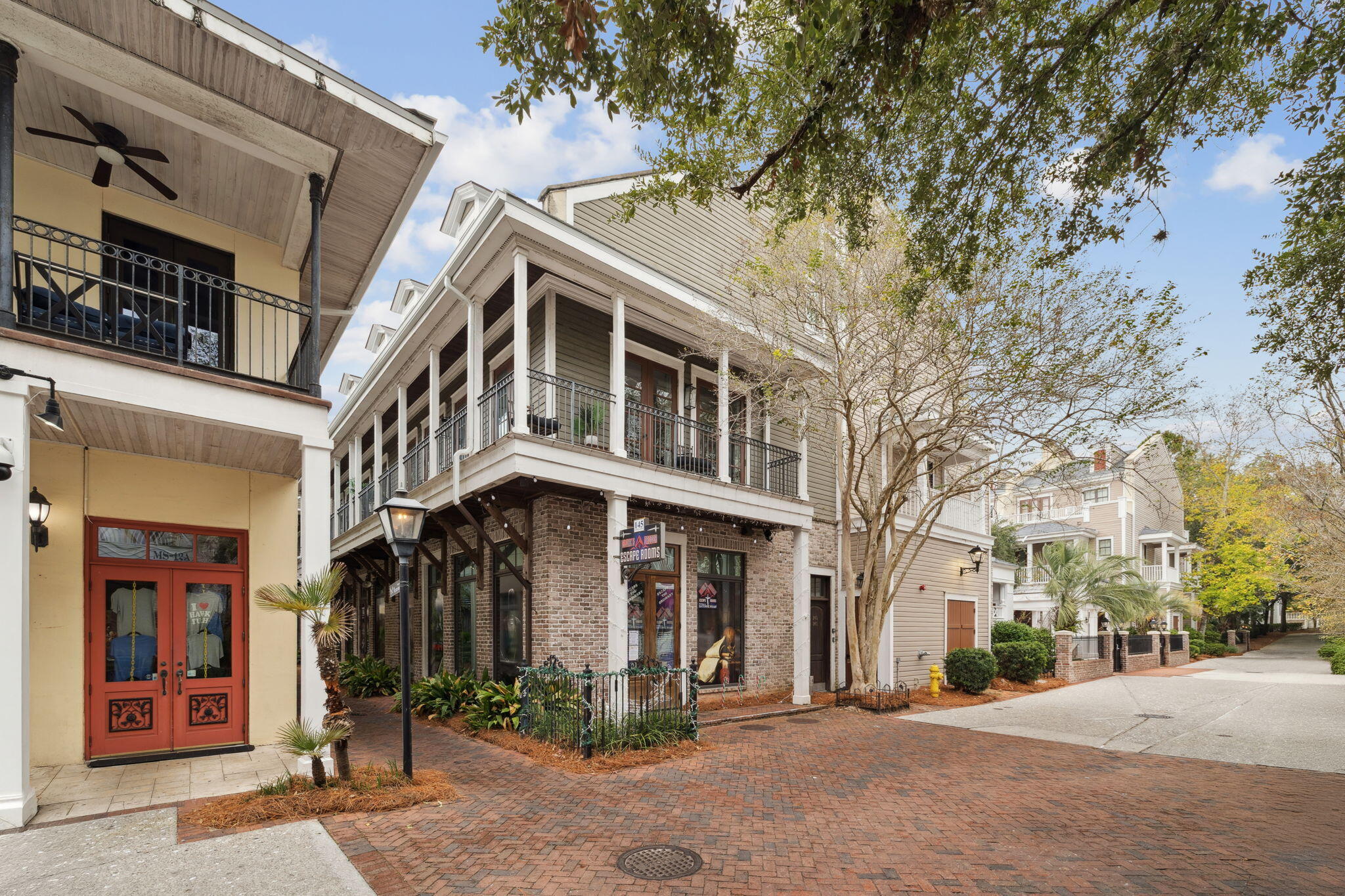 246 Fisherman's Cove, Unit 246 Miramar Beach, FL 32550 - Photo 31 of 72 a front view of a building with glass windows and door