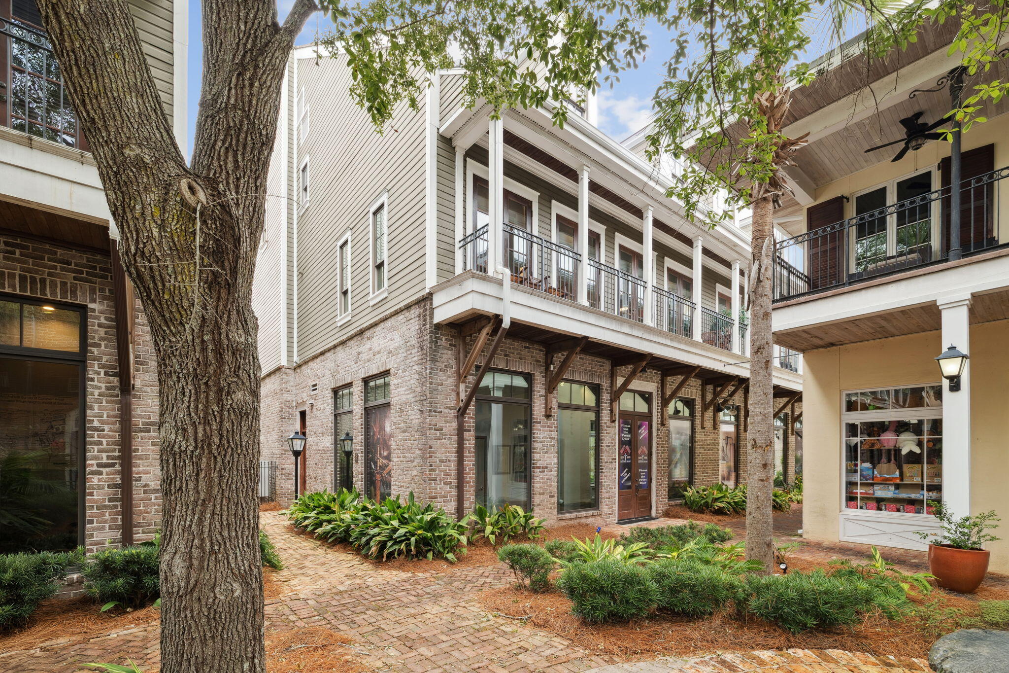 246 Fisherman's Cove, Unit 246 Miramar Beach, FL 32550 - Photo 32 of 72 a front view of a building with garden