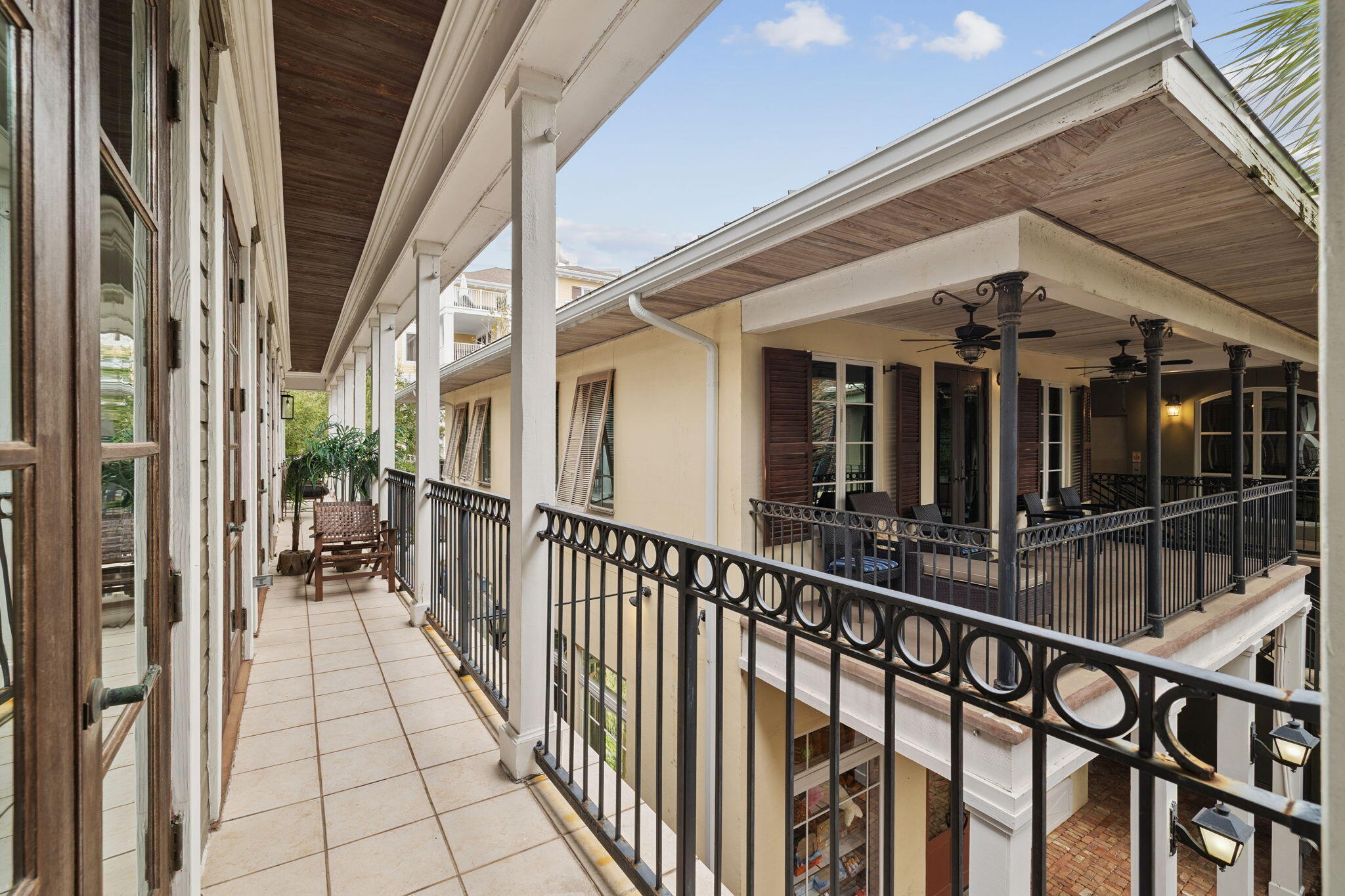 246 Fisherman's Cove, Unit 246 Miramar Beach, FL 32550 - Photo 7 of 72 a view of a porch with wooden floor and stairs