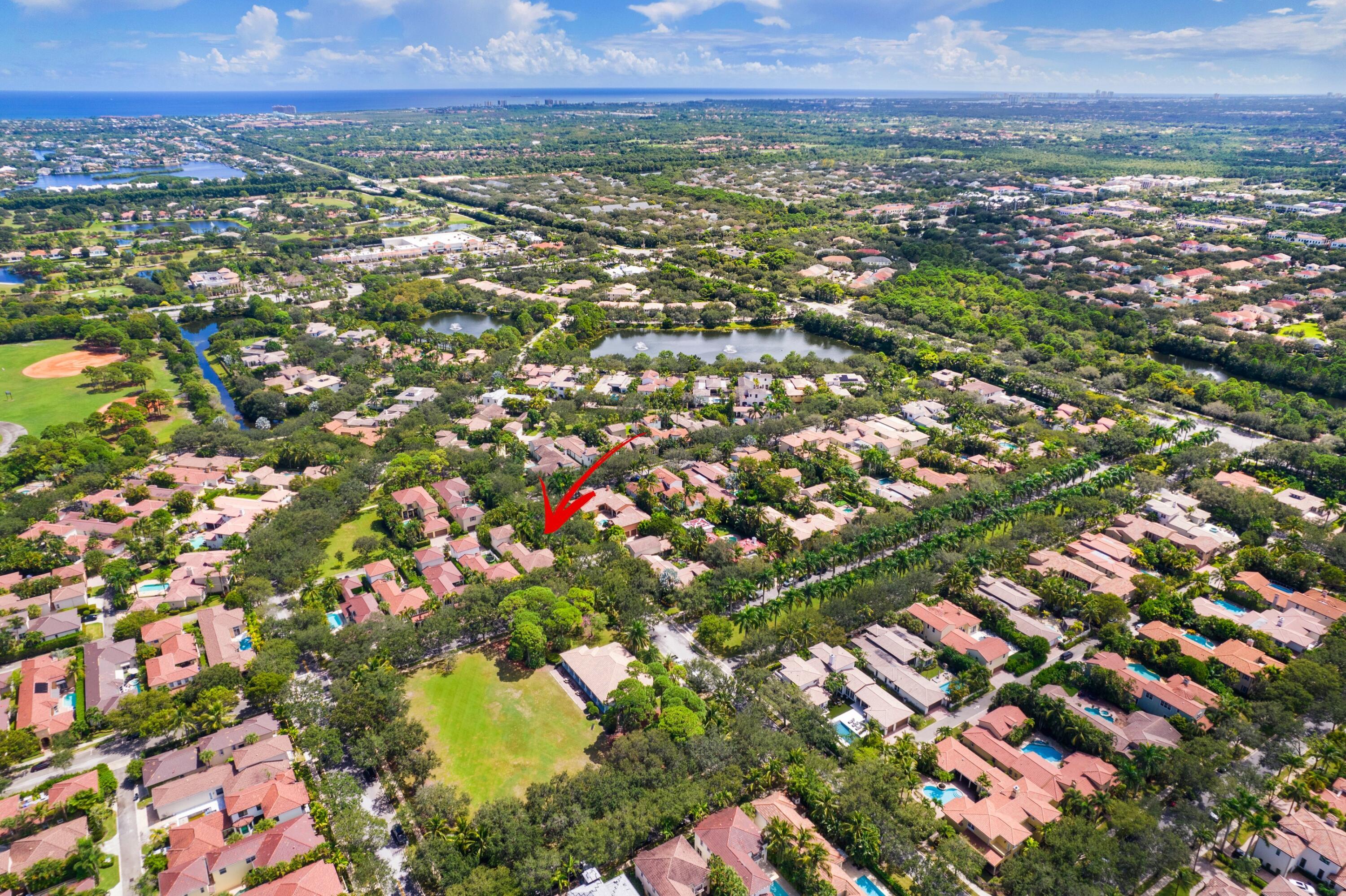 125 Bilboa Drive Jupiter, FL 33458 - Photo 5 of 5 an aerial view of residential houses with outdoor space