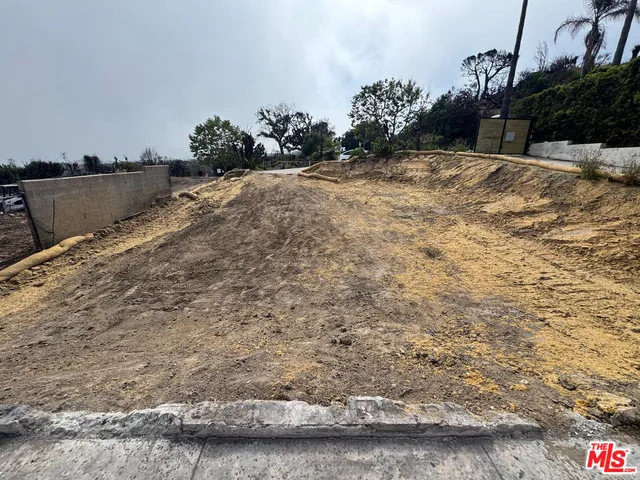 a view of a backyard of a house