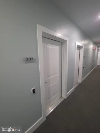 a view of hallway with closet