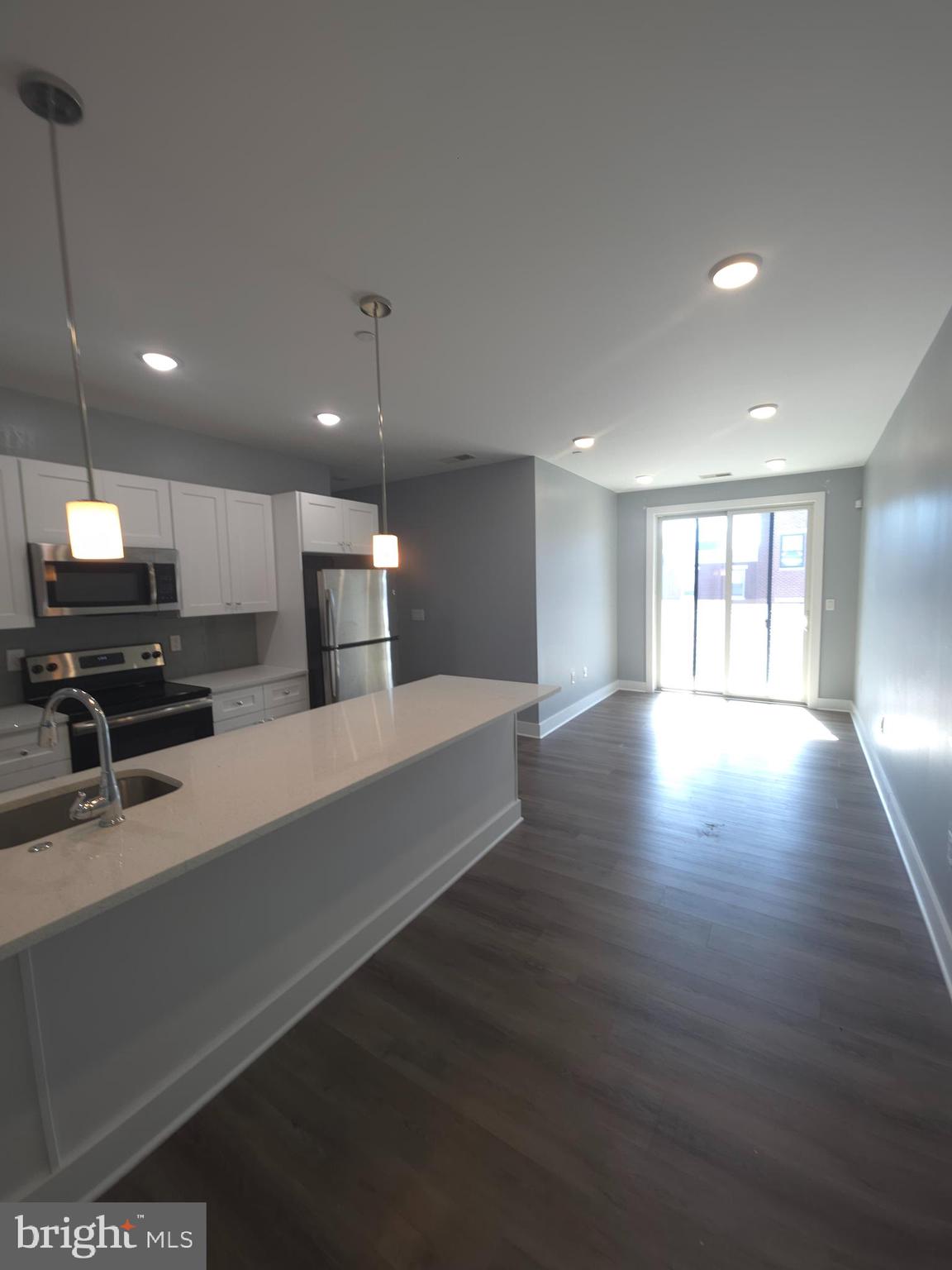 3925-29 Haverford Avenue, Unit 302 Philadelphia, PA 19104 - Photo 19 of 40 a large kitchen with stainless steel appliances a large counter top