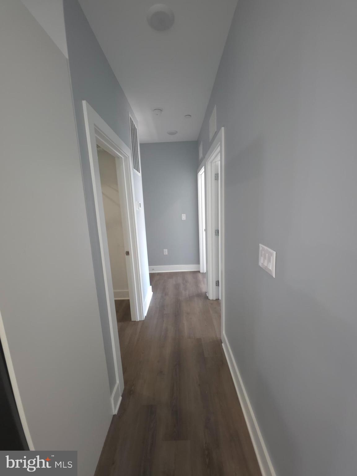 3925-29 Haverford Avenue, Unit 302 Philadelphia, PA 19104 - Photo 23 of 40 a view of a hallway with wooden floor