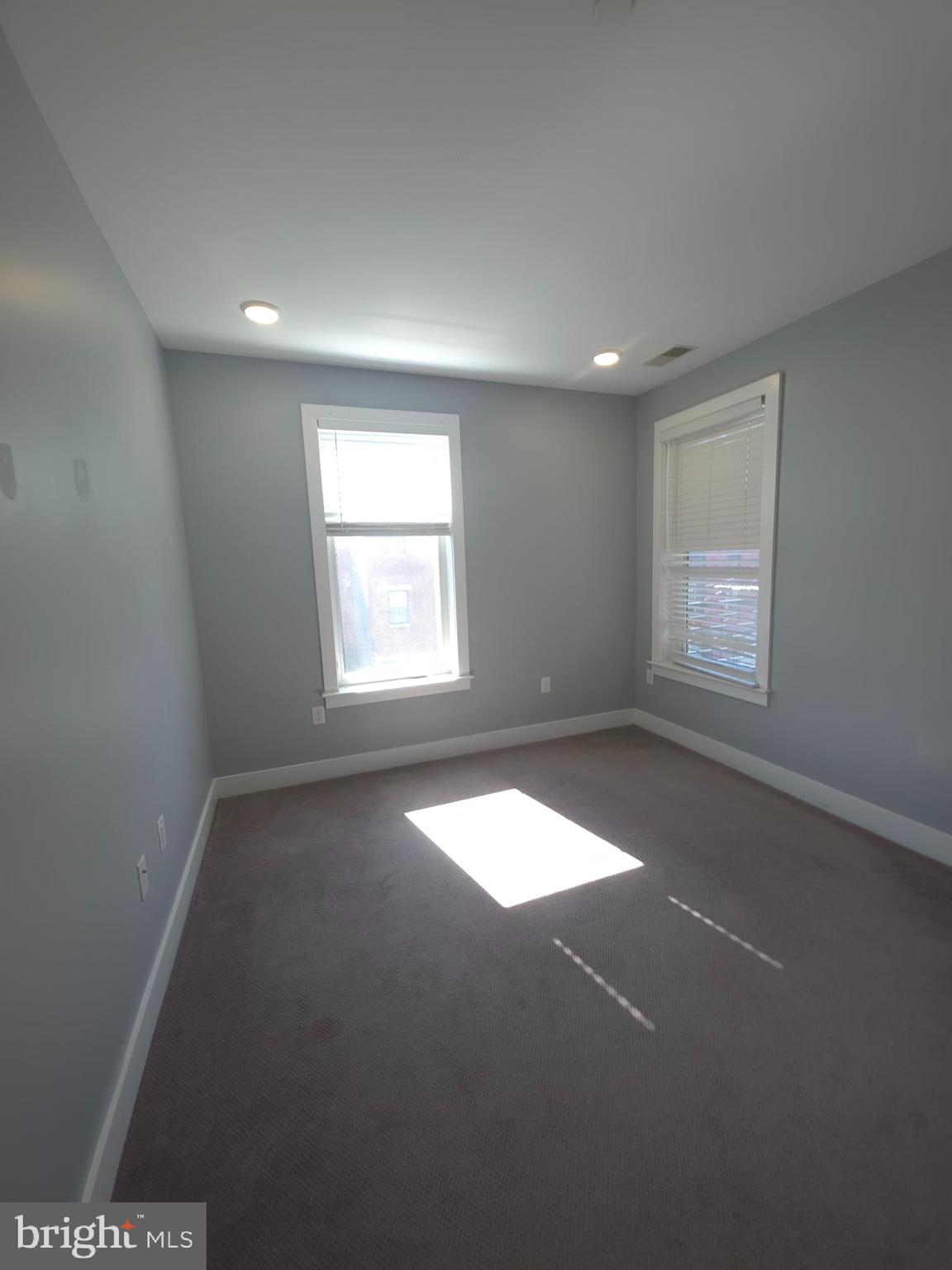 3925-29 Haverford Avenue, Unit 302 Philadelphia, PA 19104 - Photo 25 of 40 an empty room with windows