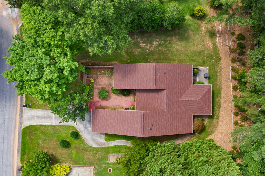 34 Hickory Way Clemson, SC 29631 - Photo 38 of 39 An aerial perspective reveals the property's lush landscaping and winding driveway, a tranquil escape.
