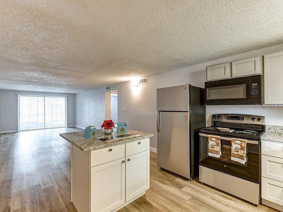 9911 Aquarius Drive, Unit 7 Port Richey, FL 34668 - Photo 3 of 26