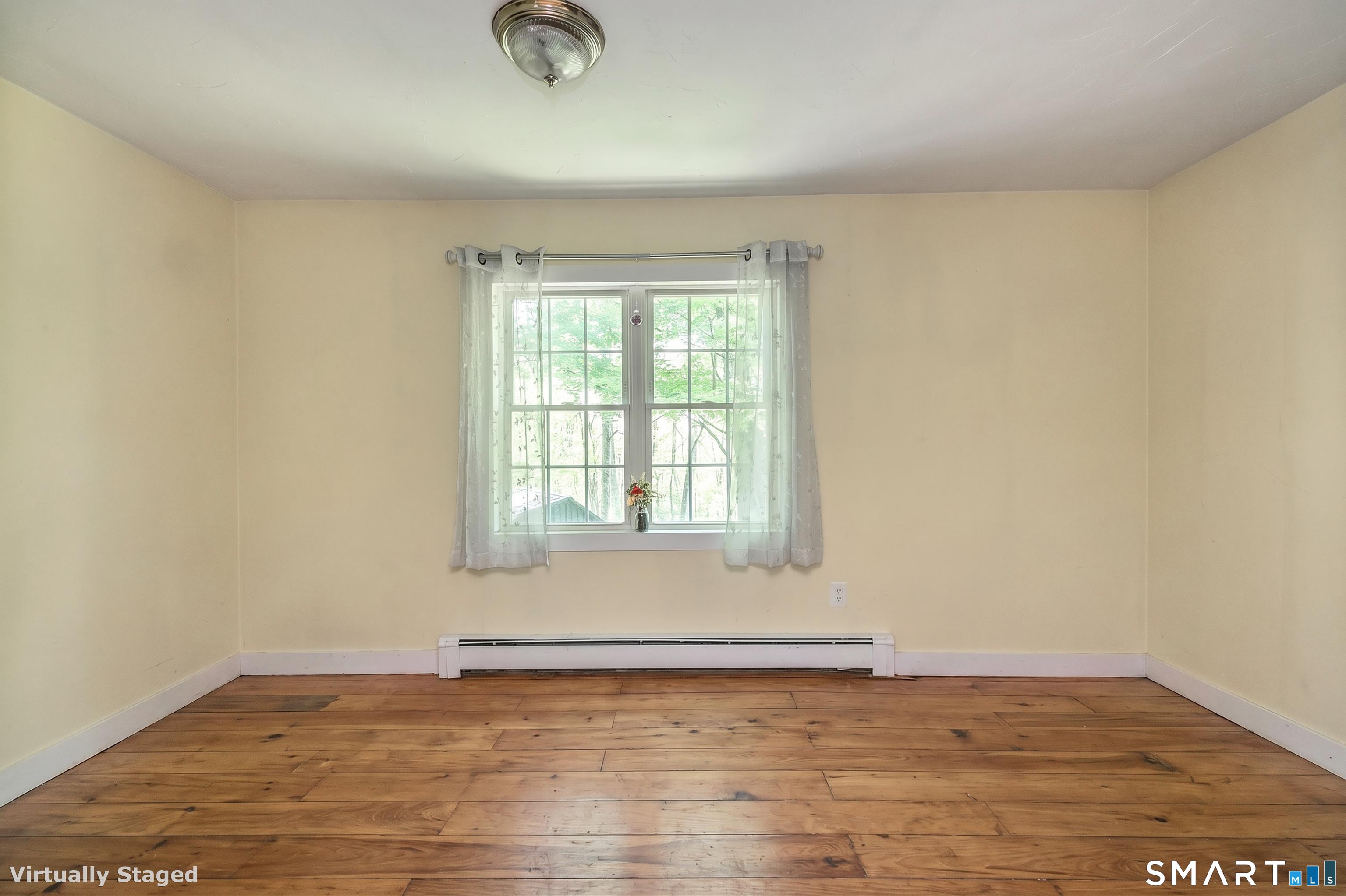 25 Bald Hill Road Kent, CT 06785 - Photo 16 of 38 Currently used as an exercise room with wide wood floors, this versatile space offers endless possibilities. What would you use it for-a cozy den, a private home office, or a quiet reading nook?