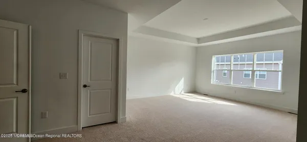 a bathroom with a double vanity sink and mirror