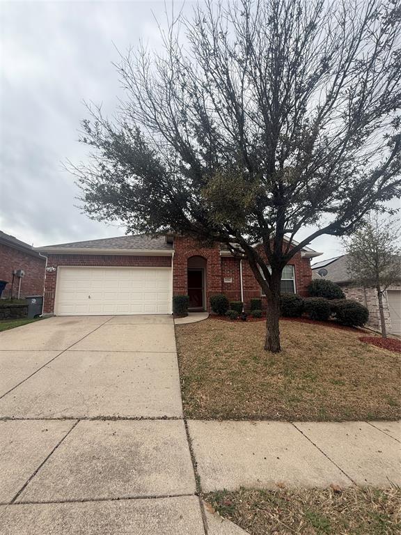 6506 Portside Ridge Lane Dallas, TX 75249 - Photo 3 of 23 a house that has a tree in front of it