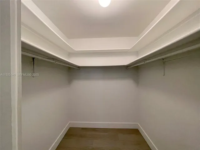 a empty room with a bench