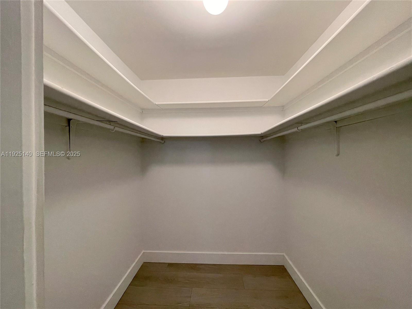 2230 Spanish Trail, Unit A Delray Beach, FL 33483 - Photo 11 of 23 a empty room with a bench