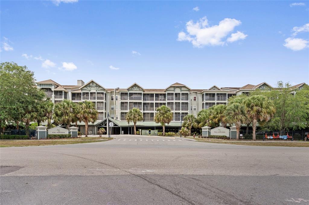14200 Avalon Road, Unit 409 Winter Garden, FL 34787 - Photo 2 of 33 a view of multiple houses with a street