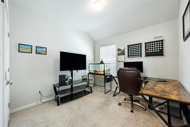 a bathroom with a bathtub sink and mirror