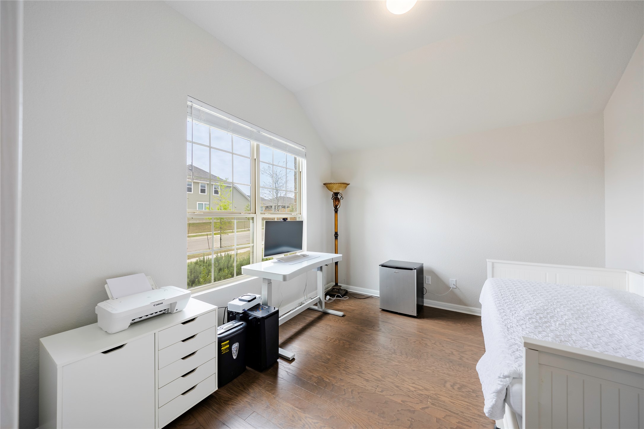 2021 Cartway Court Leander, TX 78641 - Photo 4 of 31 Office featuring baseboards, dark wood finished floors, and lofted ceiling