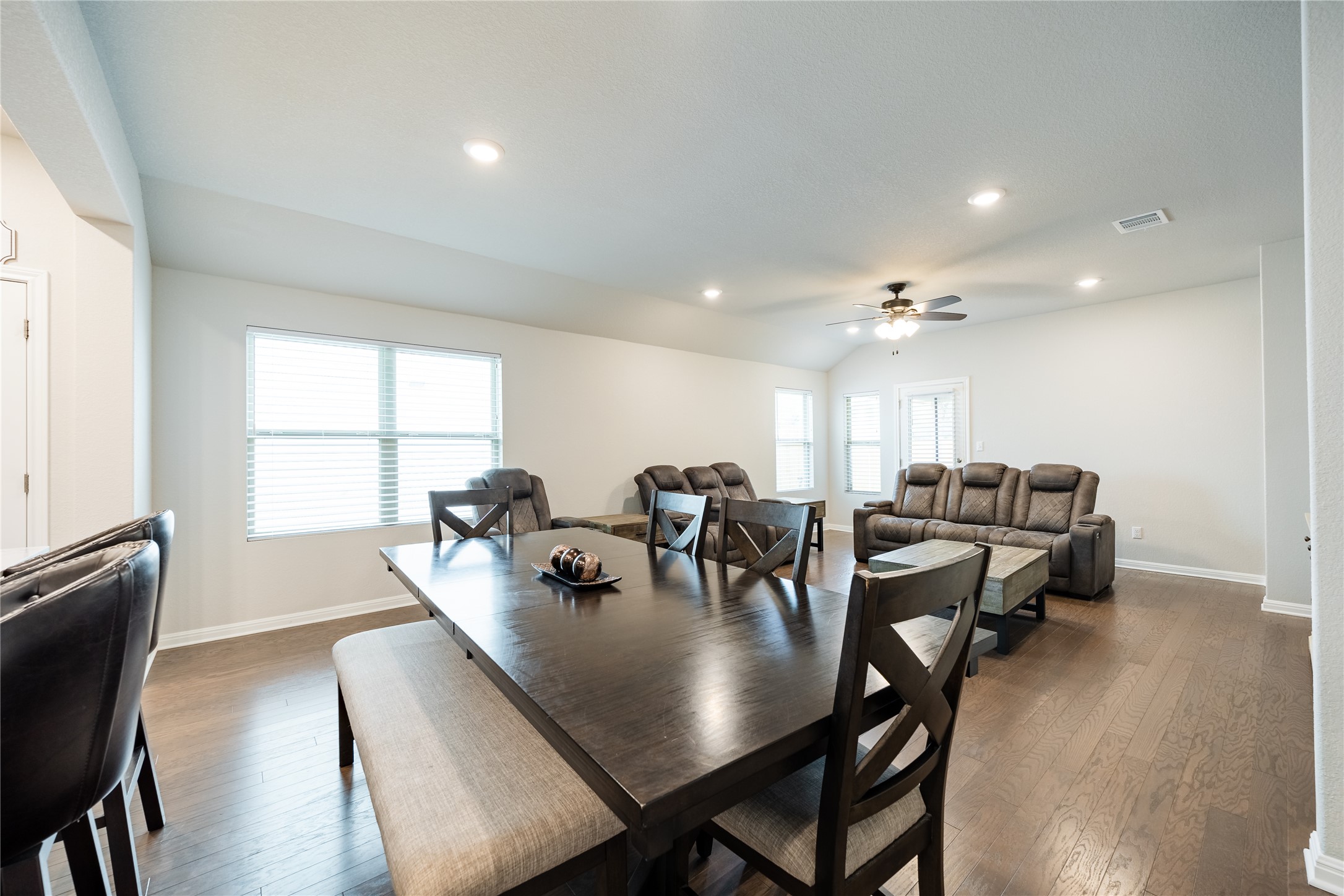2021 Cartway Court Leander, TX 78641 - Photo 8 of 31 Dining area featuring baseboards, visible vents, dark wood-style flooring, and a ceiling fan