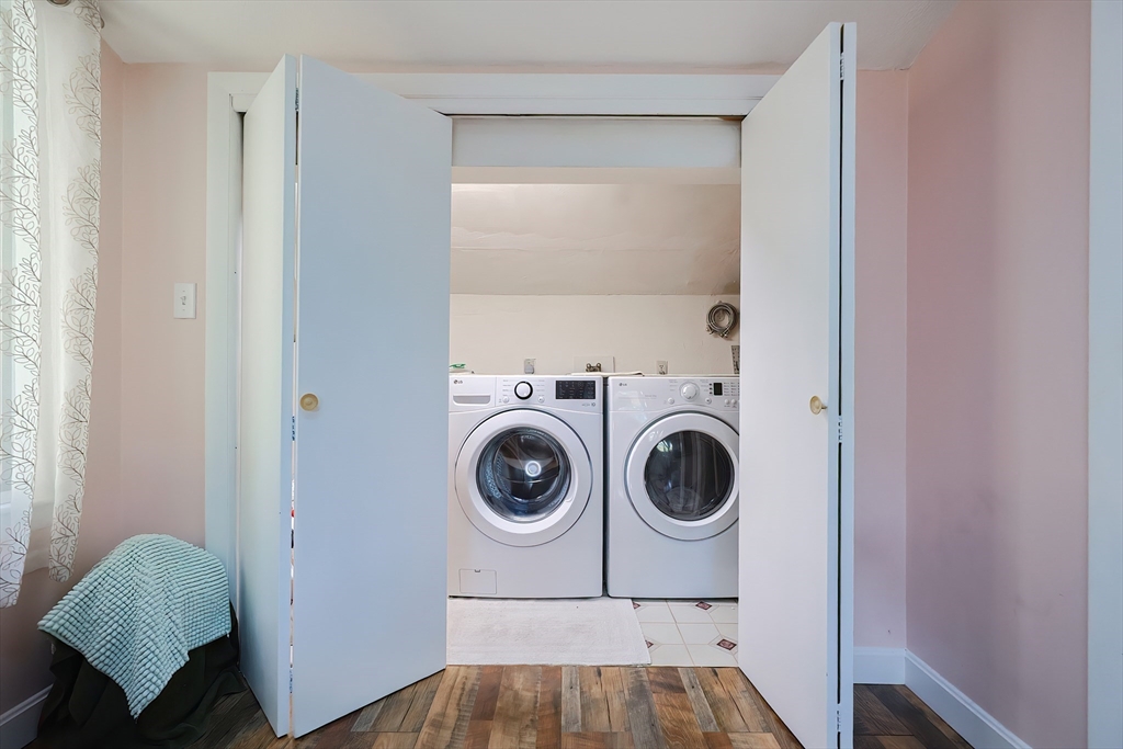20 Ruth Drive Framingham, MA 01701 - Photo 23 of 42 a view of a bedroom with washer and dryer