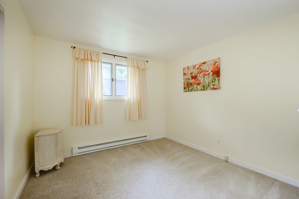 20 Ruth Drive Framingham, MA 01701 - Photo 32 of 42 an empty room with a window