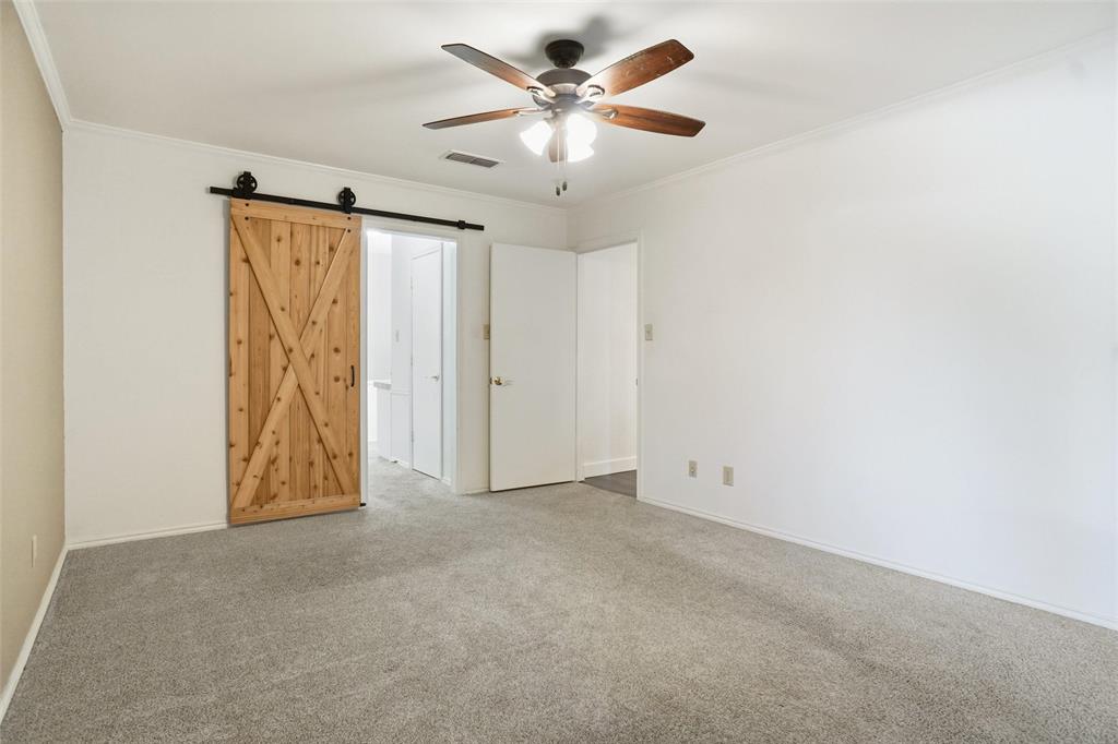 2109 Malone Street Denton, TX 76201 - Photo 14 of 36 an empty room with windows and fan