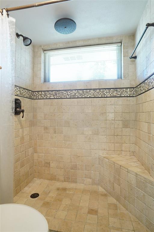 2109 Malone Street Denton, TX 76201 - Photo 17 of 36 a bathroom with a shower