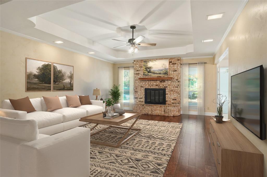 2109 Malone Street Denton, TX 76201 - Photo 2 of 36 a living room with furniture a flat screen tv and a fireplace