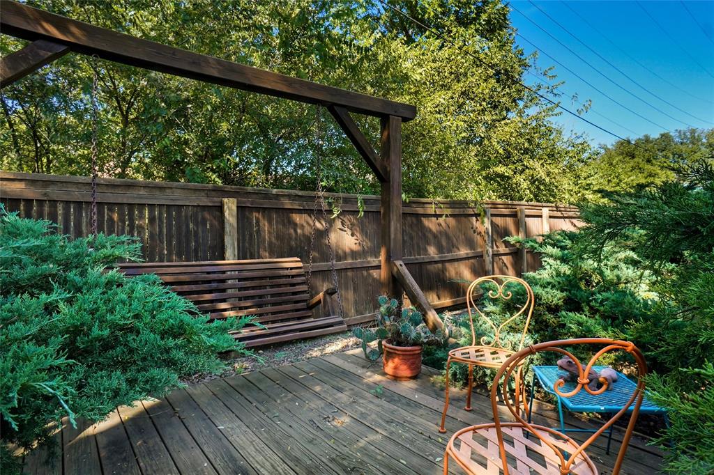 2109 Malone Street Denton, TX 76201 - Photo 27 of 36 a view of balcony with wooden floor and outdoor seating