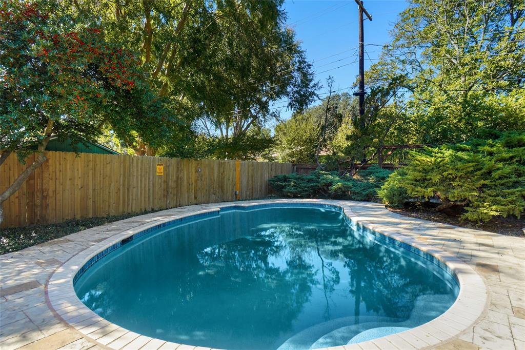 2109 Malone Street Denton, TX 76201 - Photo 29 of 36 a view of a swimming pool with a sitting area