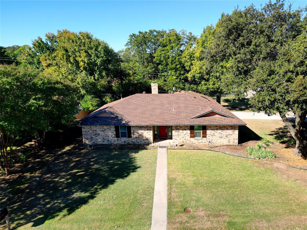 2109 Malone Street Denton, TX 76201 - Photo 32 of 36 a house view with a backyard space