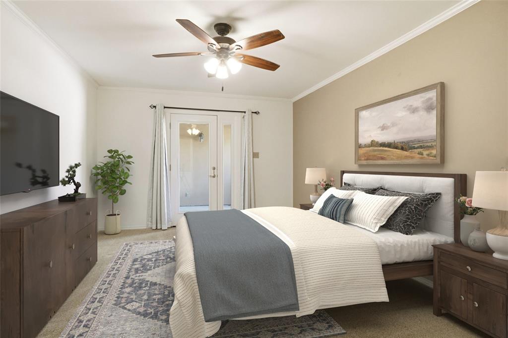 2109 Malone Street Denton, TX 76201 - Photo 6 of 36 a bedroom with a large bed and a flat screen tv