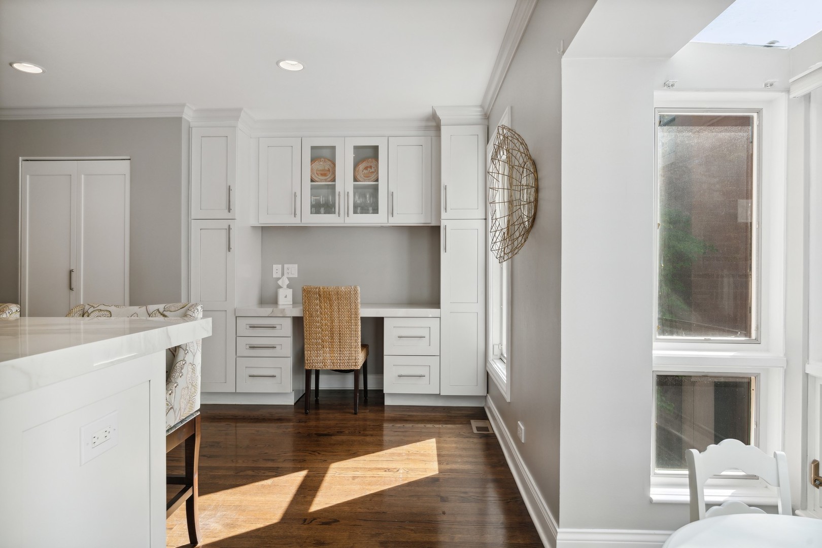 641 West Willow Street, Unit 105 Chicago, IL 60614 - Photo 13 of 37 a view of kitchen with furniture and wooden floor