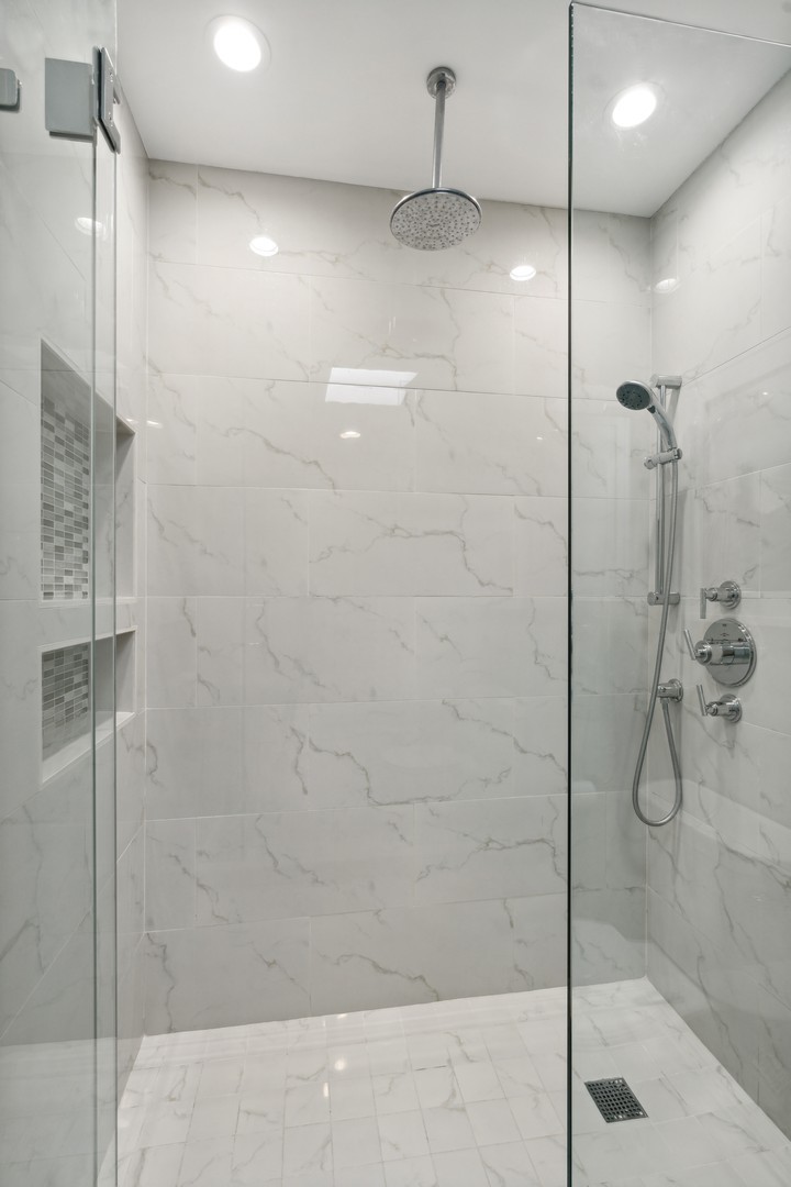 641 West Willow Street, Unit 105 Chicago, IL 60614 - Photo 22 of 37 a bathroom with a shower