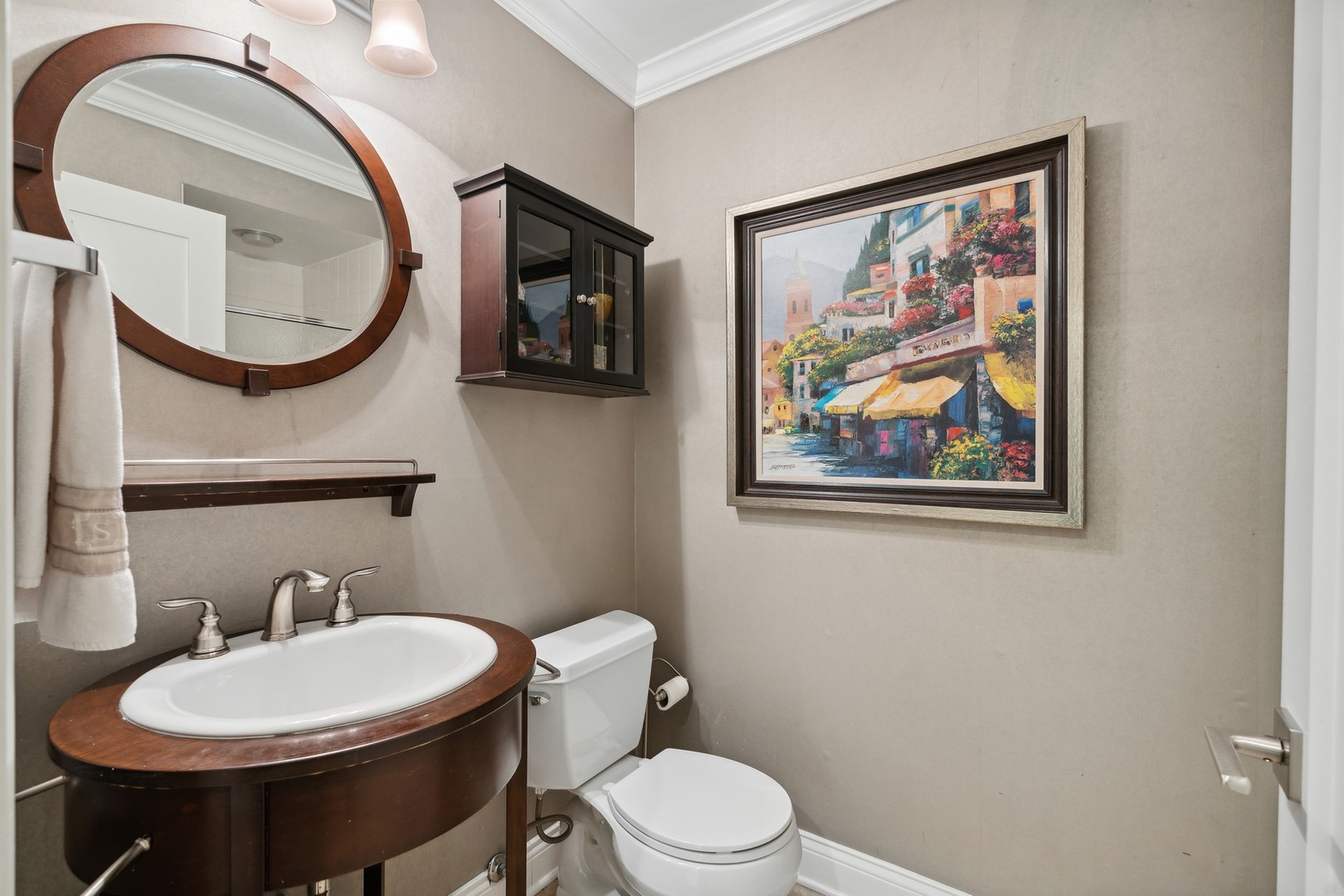 641 West Willow Street, Unit 105 Chicago, IL 60614 - Photo 26 of 37 a bathroom with a toilet a sink and a mirror